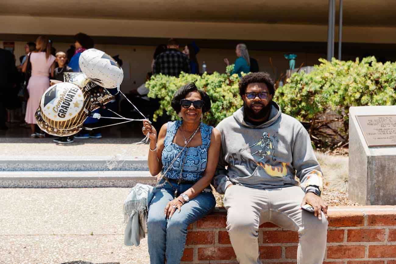 parents at graduation smiling